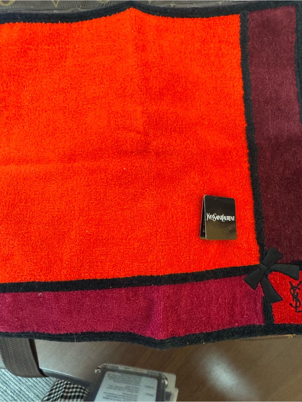 Yves Saint Laurent Red and Burgundy washcloth